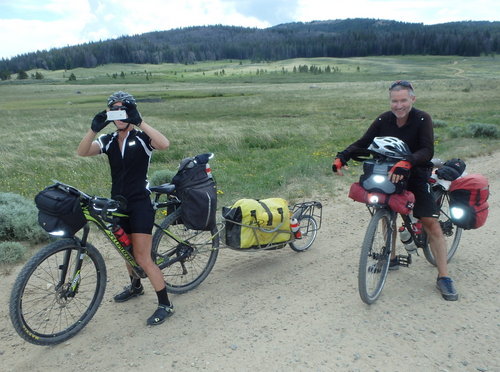 GDMBR: We met these two riders (3 total) at a pond next to Lake of the Woods.